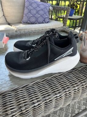 Altra Ladies Black Running Shoes with White Midsole and Silver Logo